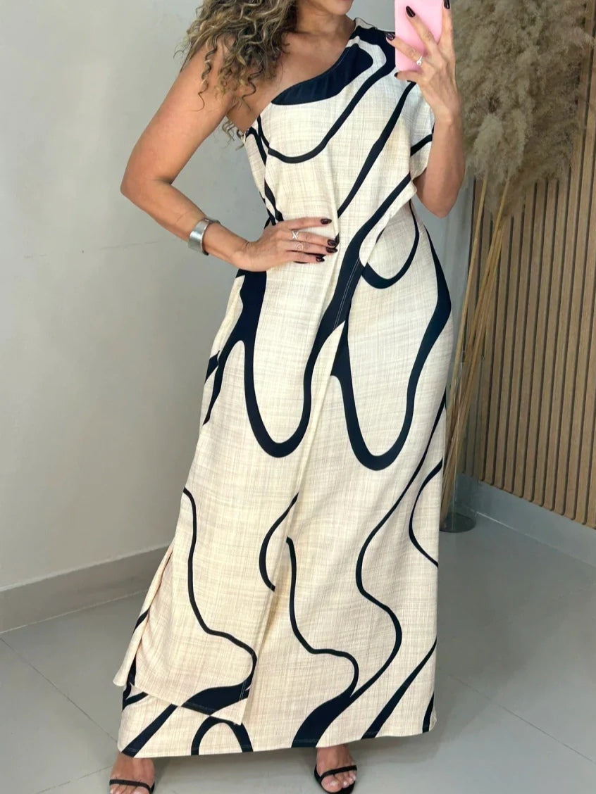 Abito maxi con scollo off-shoulder a motivo astratto